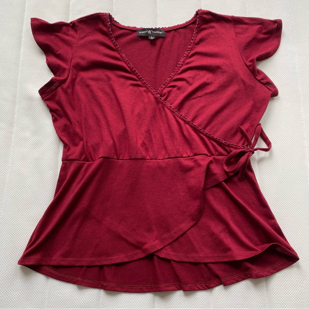 Almost Famous Wrap Front Flutter Sleeve Top in Burgundy